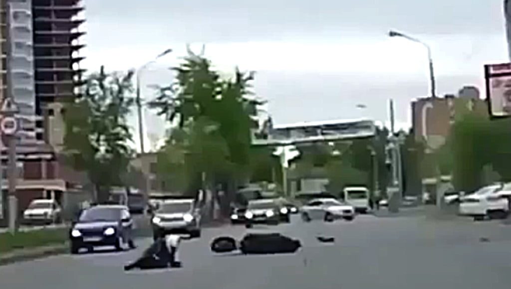 Motocyklem w plecy