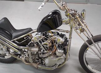 stainless  harley davidson knucklehead has oil running through its frame